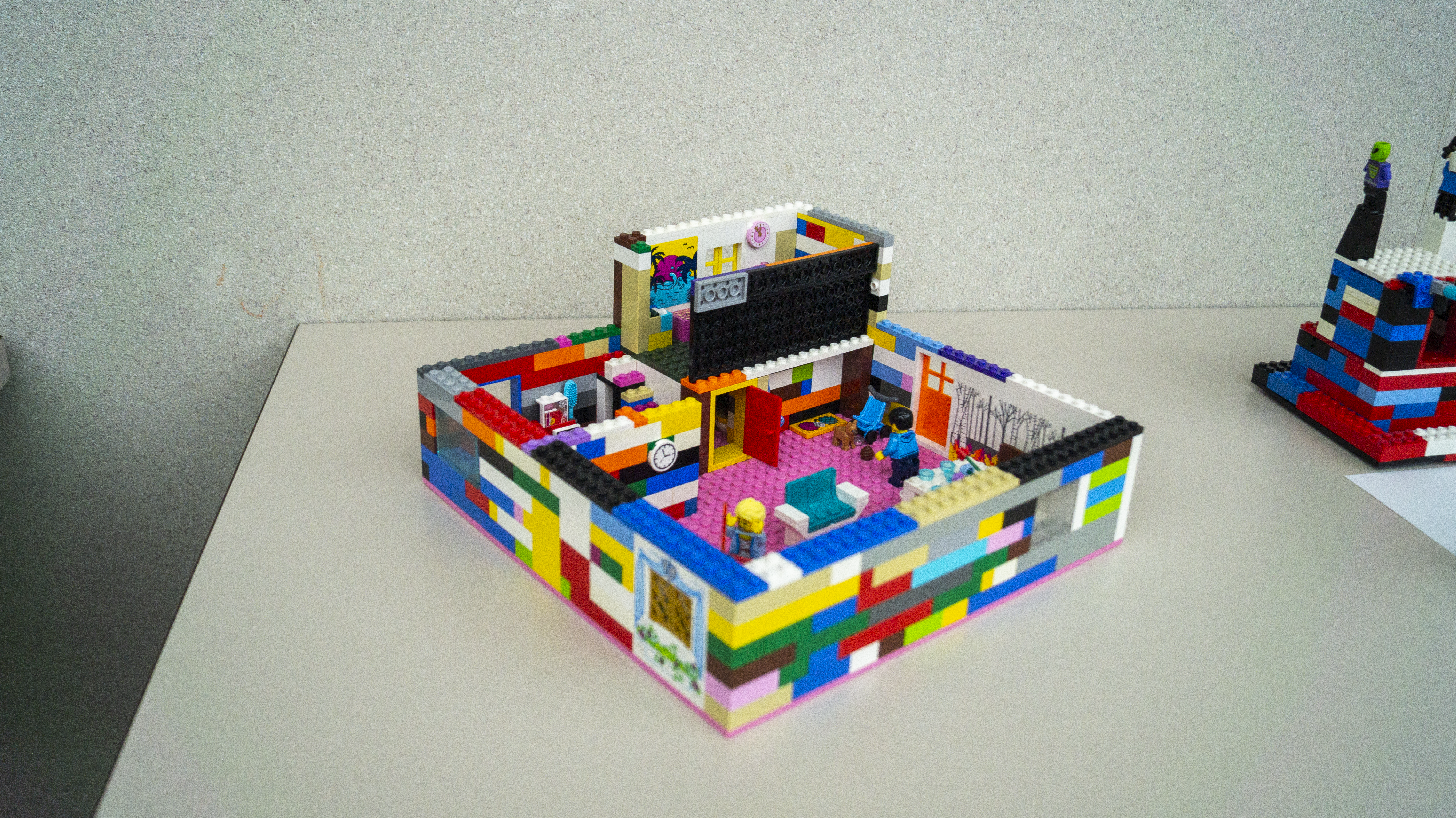 A Lego creation showing the inside of a house.