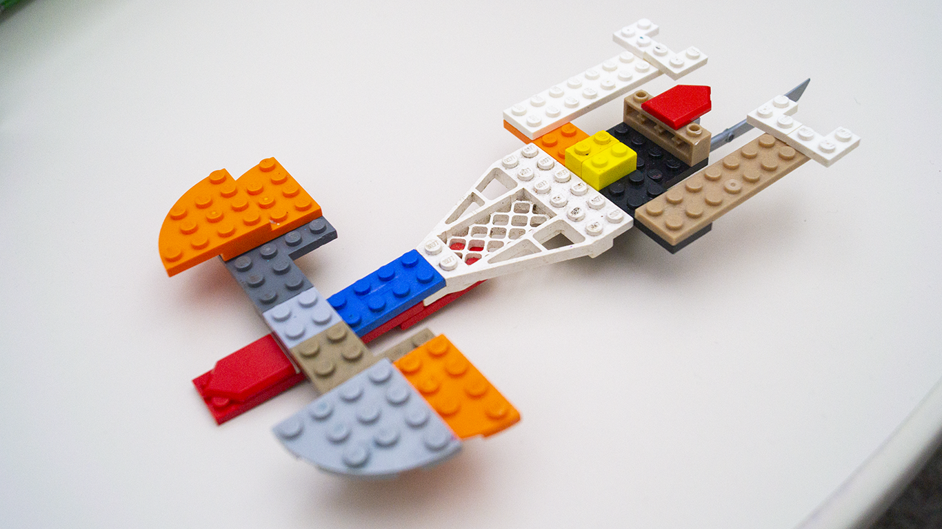 Lego creation that looks like a spaceship. 