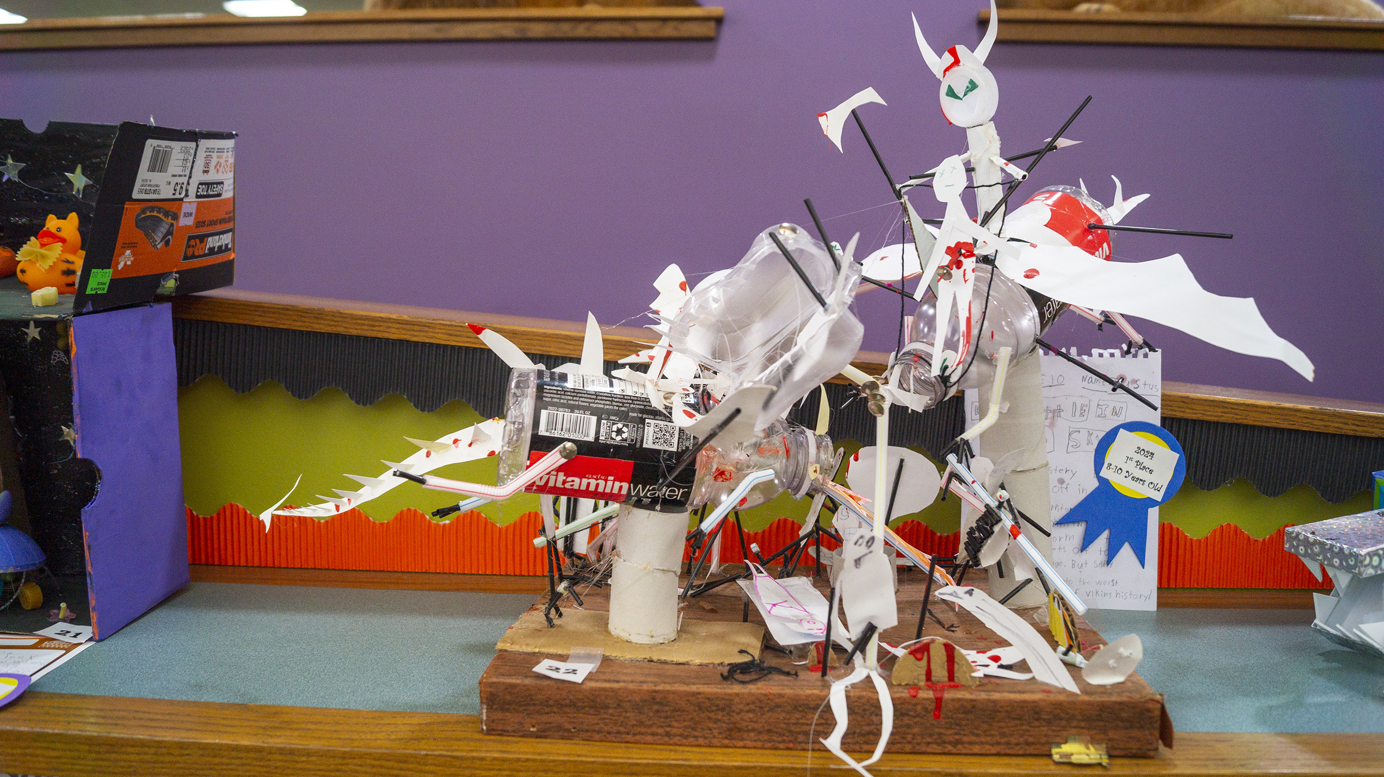 Creature Carnival winning entry in the 8-10 year old category: Dragon Battle in the Sky by Justus K.