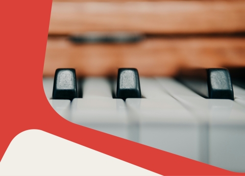 Piano Keys on a red background.