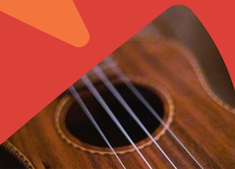 A close up of a ukulele 