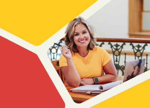 Person smiling enjoying the writing process. 